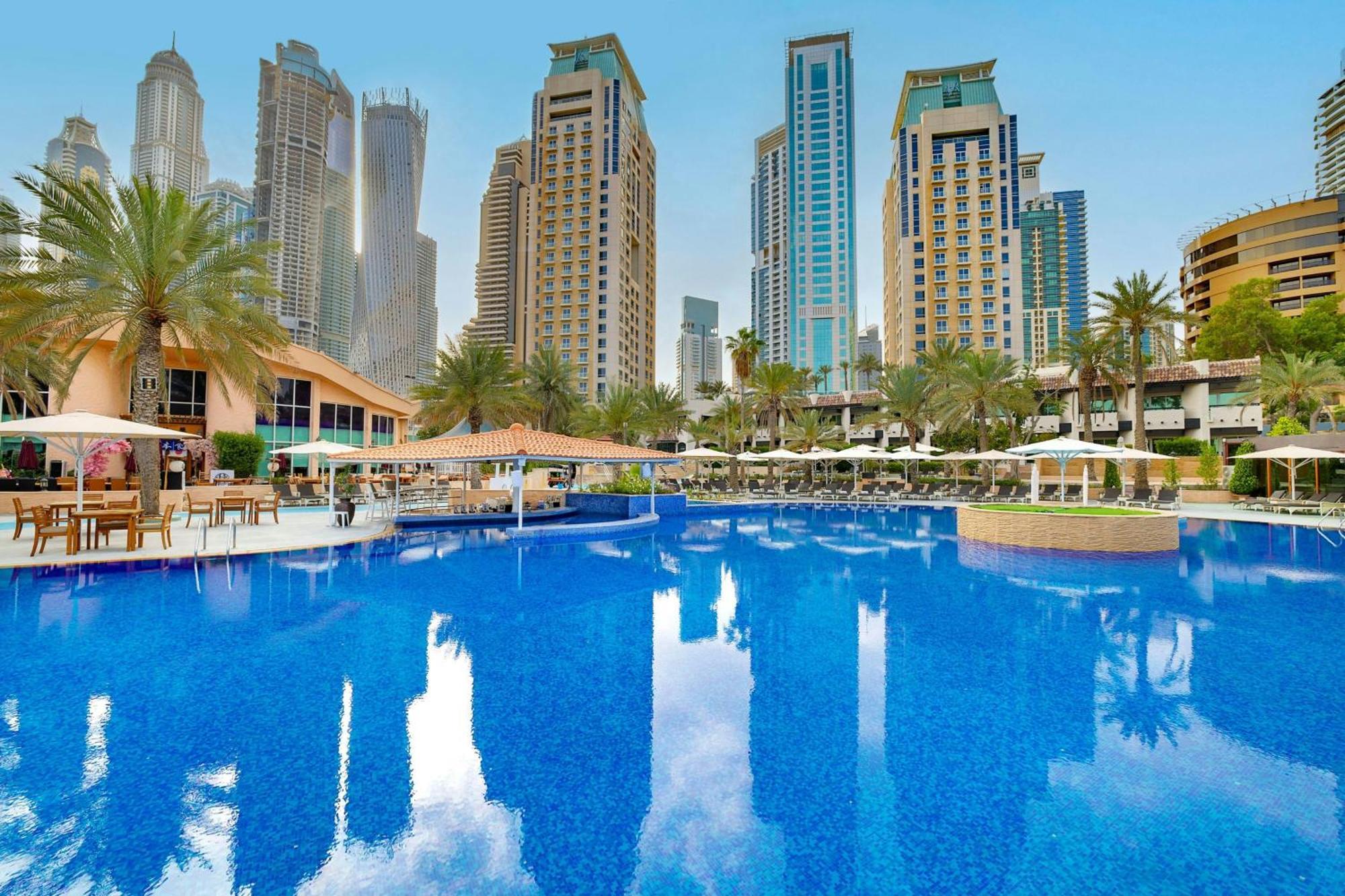 합투어 그랜드 리조트, 오토그래프 콜렉션 두바이 외부 사진 The swimming pool at Jumeirah Beach Hotel